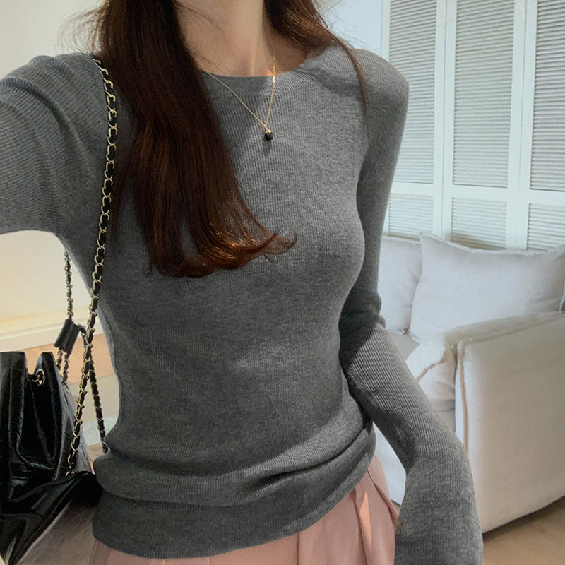 Women's knitted pullover, round neck, long sleeved, fitted