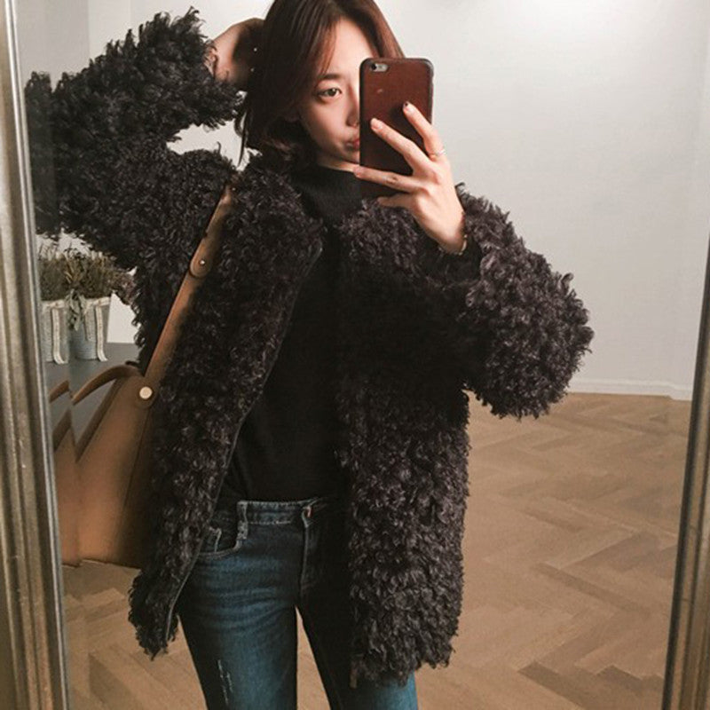 Loose teddy coat made of lambswool