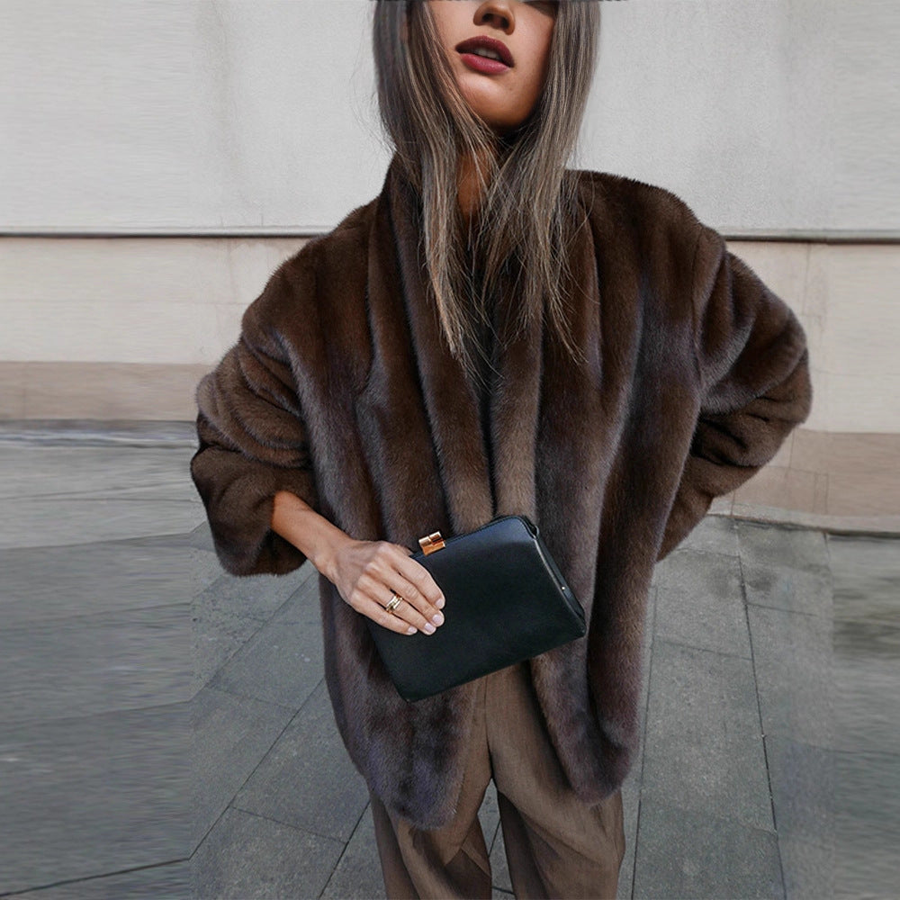 Loose women's faux fur coat in brown