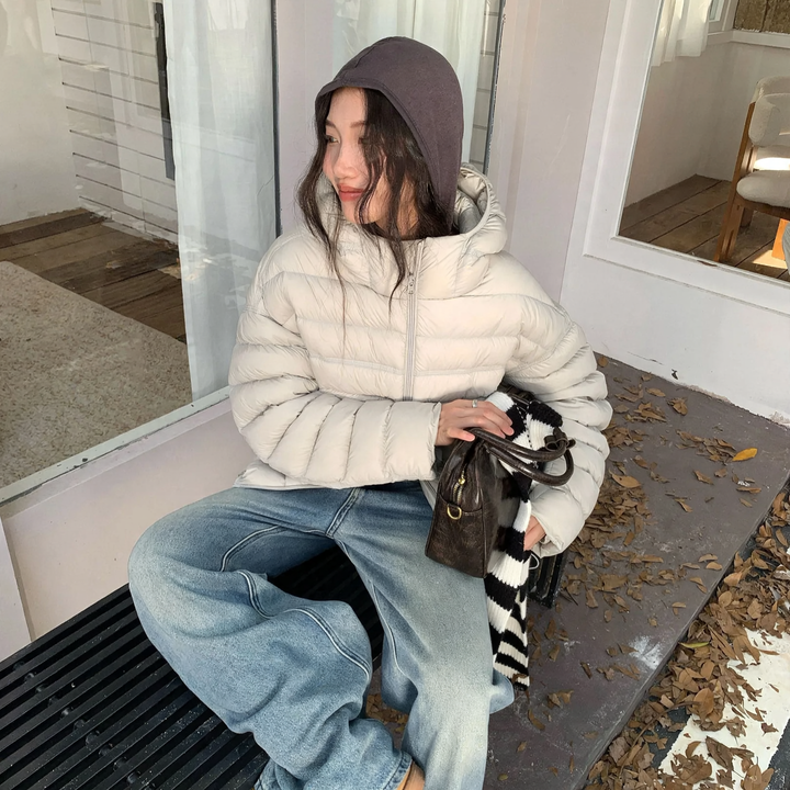 Light women's down jacket with hood