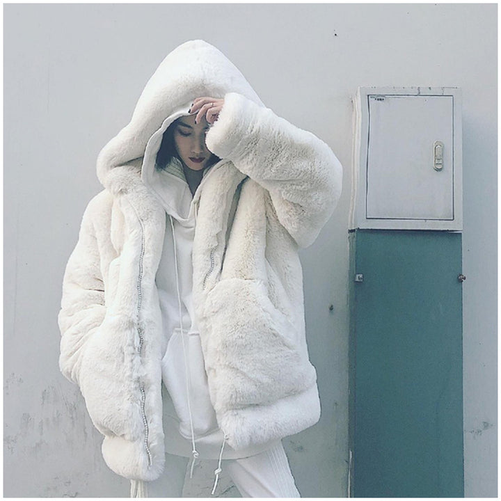 Loose faux fur coat with hood for women