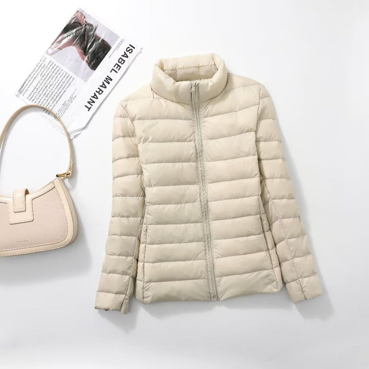 Light women's down jacket, short, with white duck down