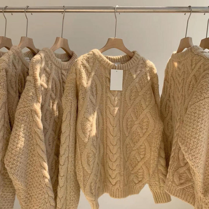 Chunky knit sweater with cable pattern