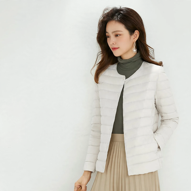 Light women's down jacket, short, as a base layer jacket