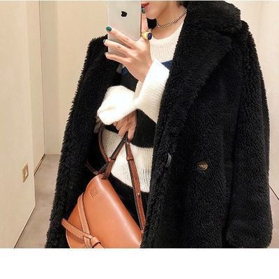 Loose women's winter coat in teddy look
