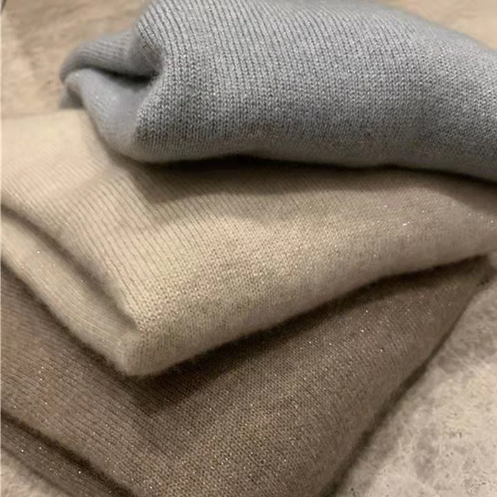 Women's wool pullover with stand-up collar and shine effect