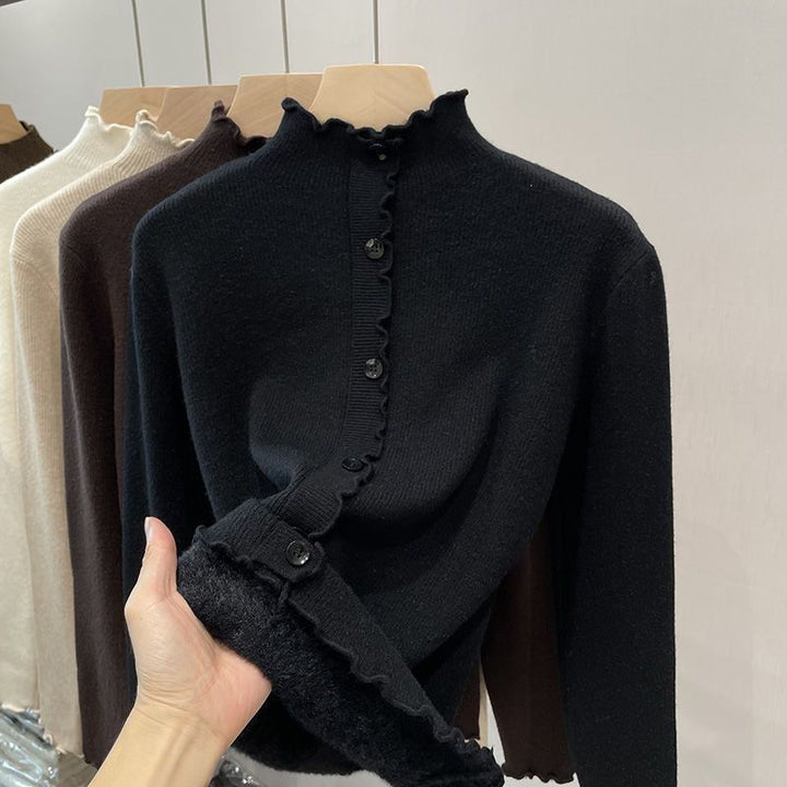 Women's pullover with stand-up collar and wave hem