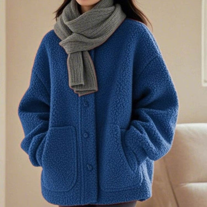 Sheepskin coat, loose, with pockets