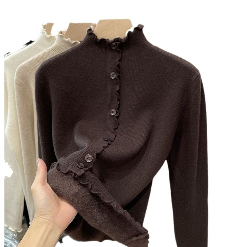 Women's pullover with stand-up collar and wave hem