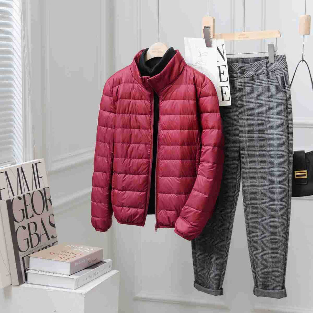 Light women's down jacket with stand-up collar, white duck down
