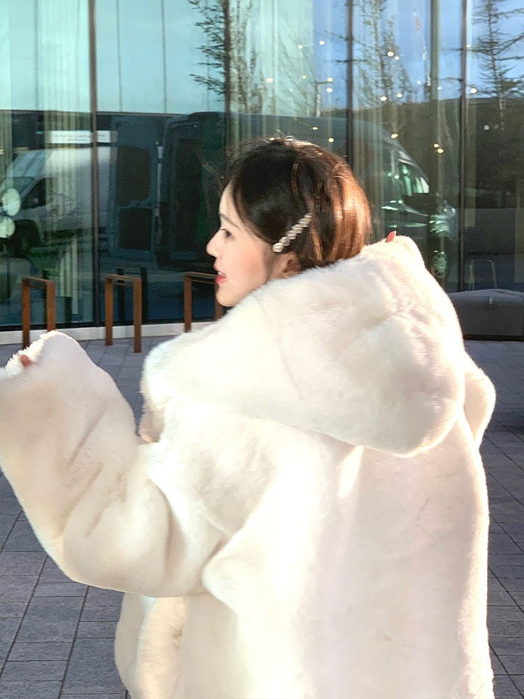 Mid-length coat with hood made of lamb fleece imitation