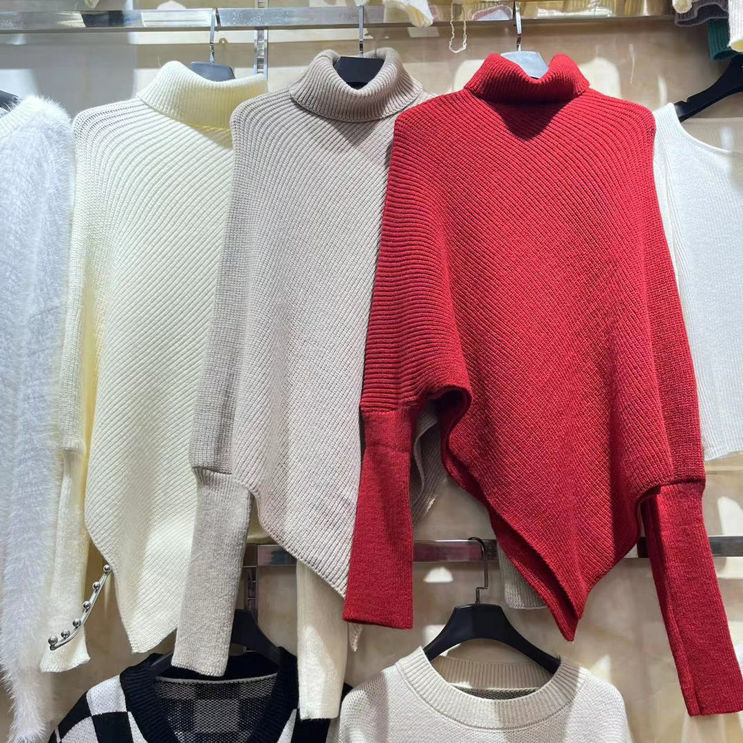Women's turtleneck sweater with irregular hem