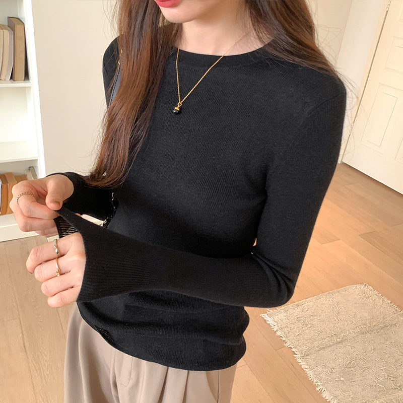 Women's knitted pullover, round neck, long sleeved, fitted