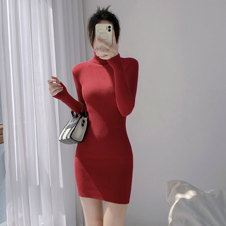 Women's knitted dress with turtleneck made of core yarn