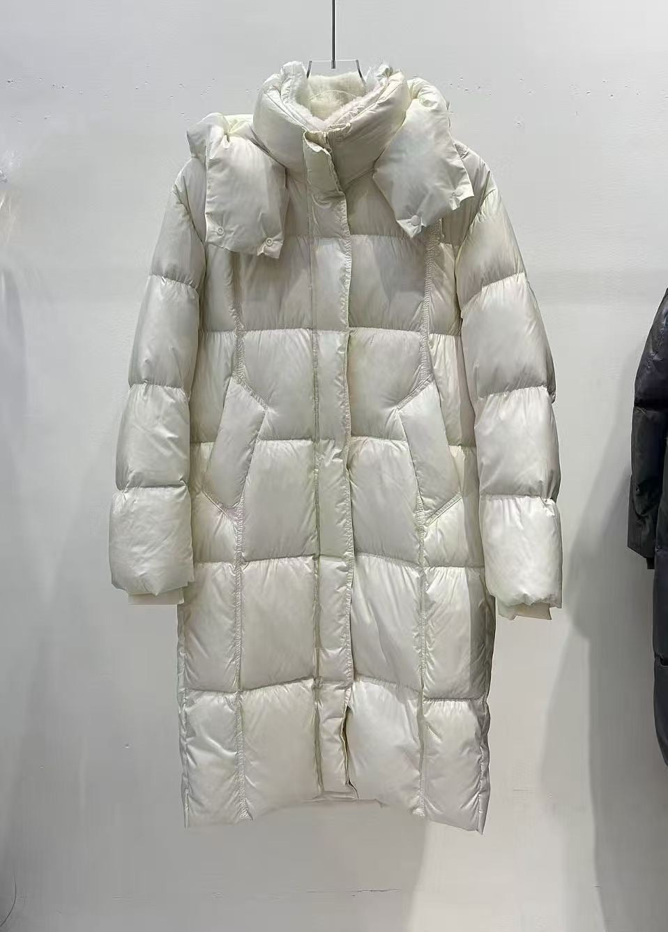 Long women's down coat with lambskin collar