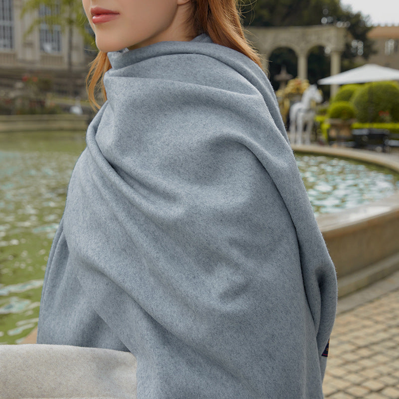 Solid color wool scarf, wearable as a scarf or stole