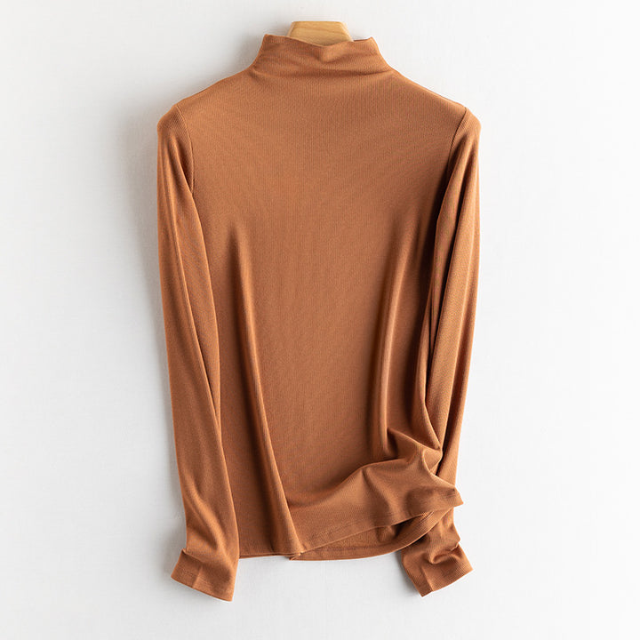 Warm knit sweater with silk content and inner lining