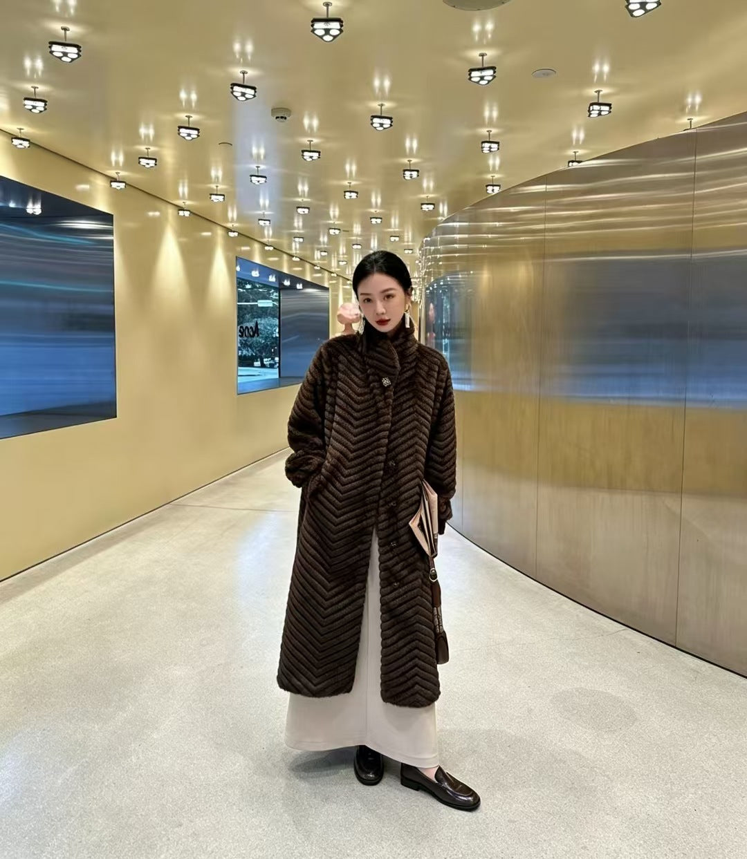 Women's coat in fur look with herringbone pattern