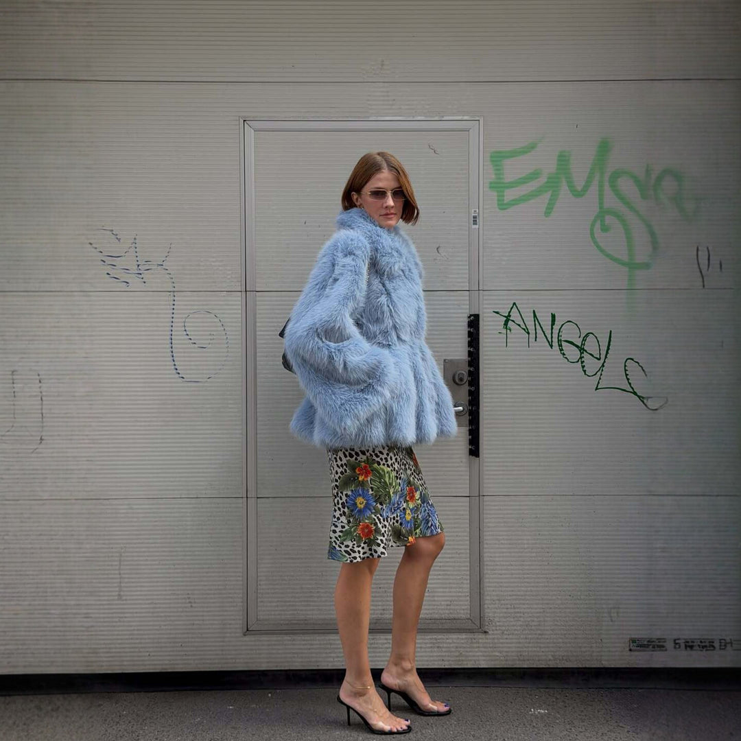 Mid-length women's faux fur coat