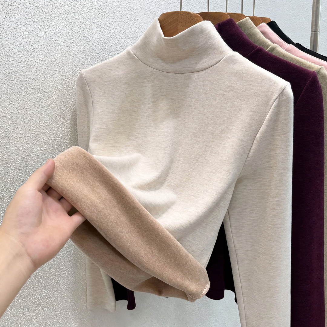 Wool blend turtleneck sweater with thermal lining