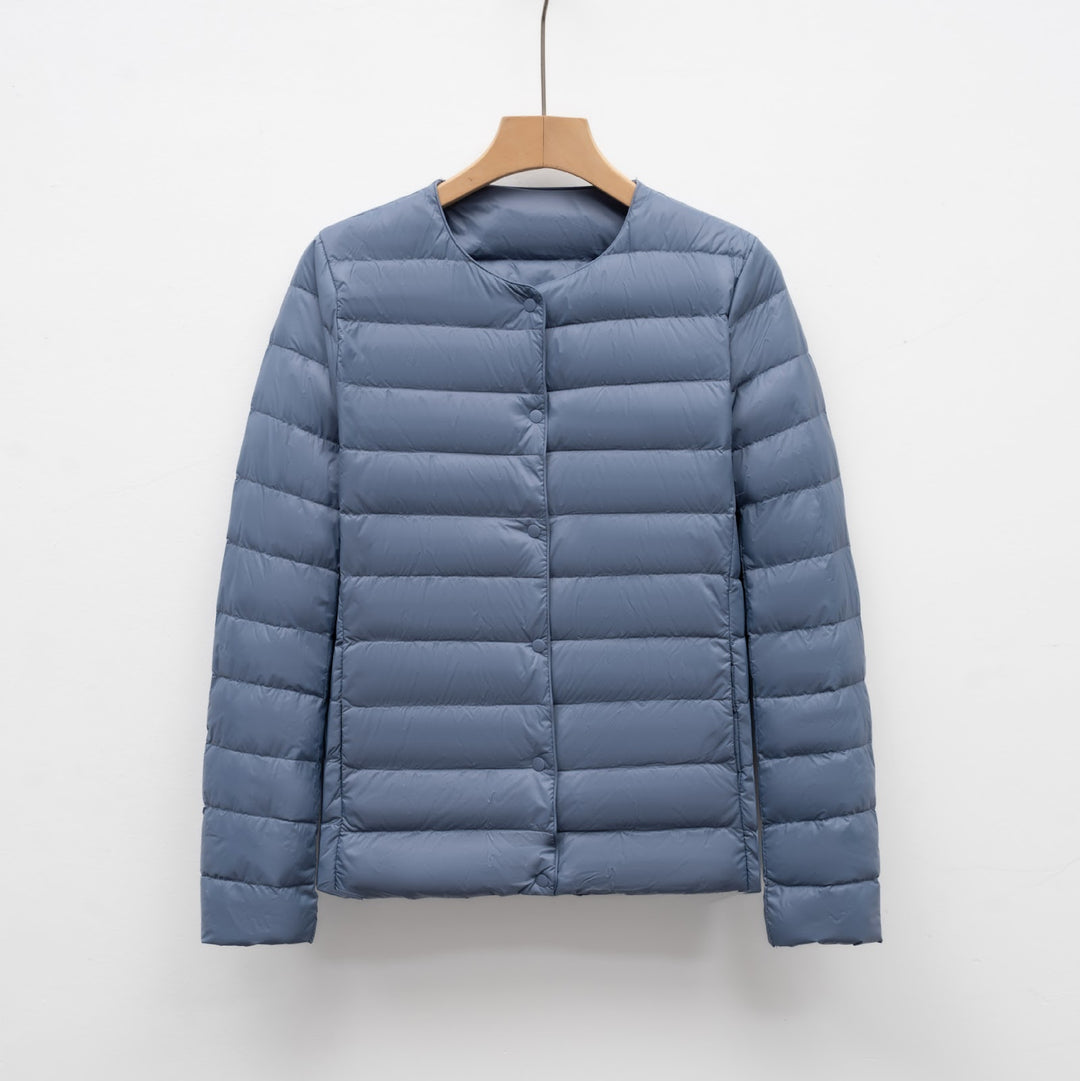 Light women's quilted jacket with round neckline