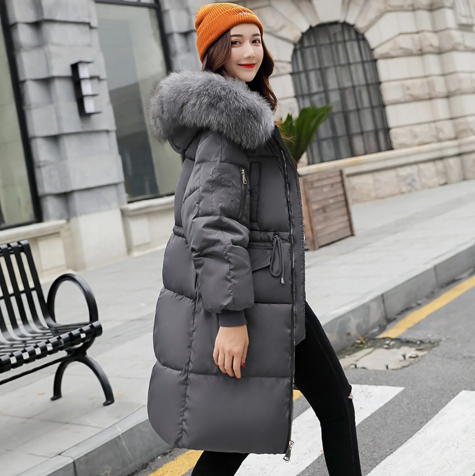 Padded women's winter jacket, mid-length, with fur collar