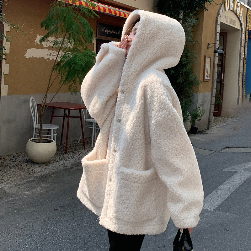Fluffy women's hooded coat with lambskin imitation