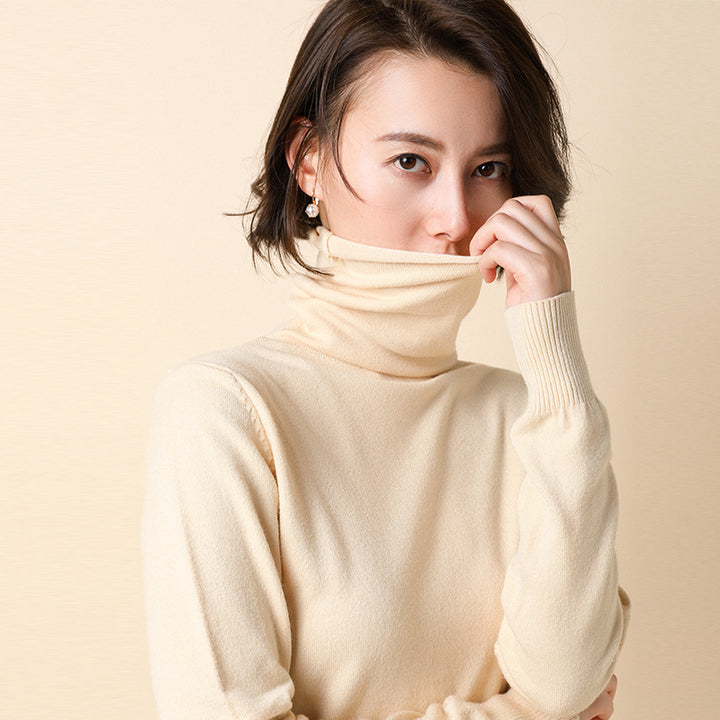 Women's knitted pullover with stand collar and geometric pattern