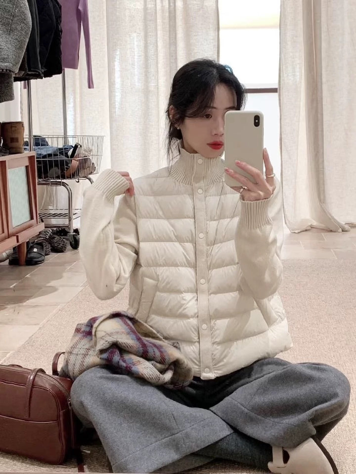 Short women's down jacket with knitted sleeves