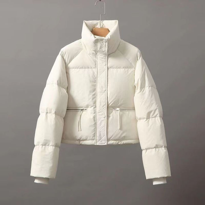 Short ladies' quilted jacket with stand-up collar