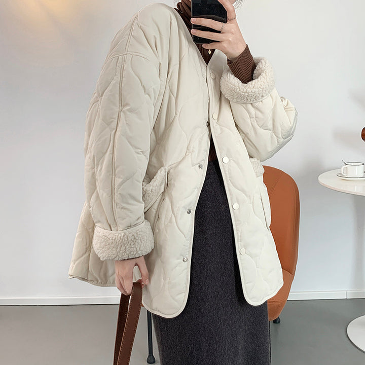 Women's quilted jacket with lambskin inserts and V-neck