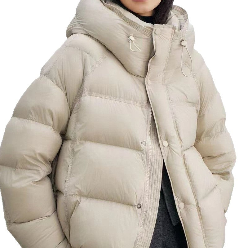 Short women's down jacket with duck down filling