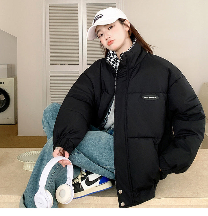Loose, padded winter jacket with stand-up collar