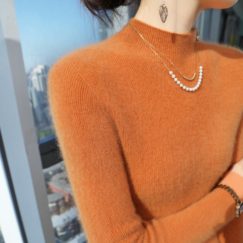 Women's knitted pullover with stand-up collar, fitted