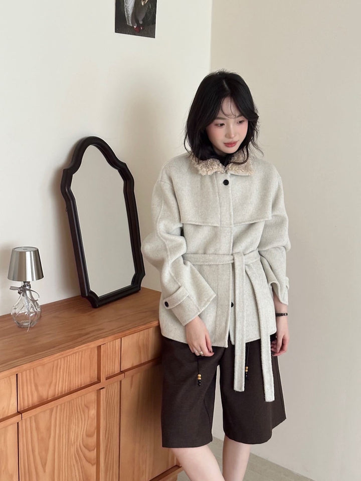 Women's coat with faux sheepskin details, lined