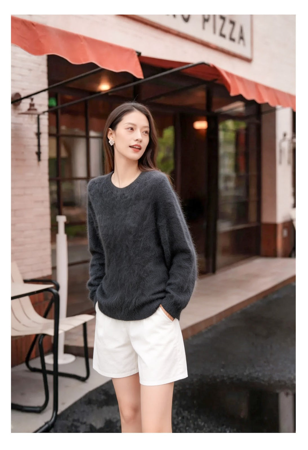 Women's knit sweater made of wool blend with V-neck