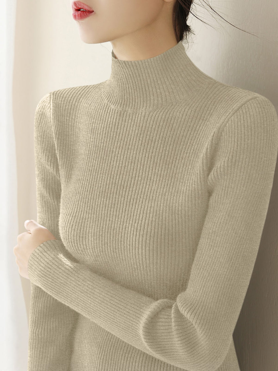 Women's knitted pullover with stand-up collar, slim fit