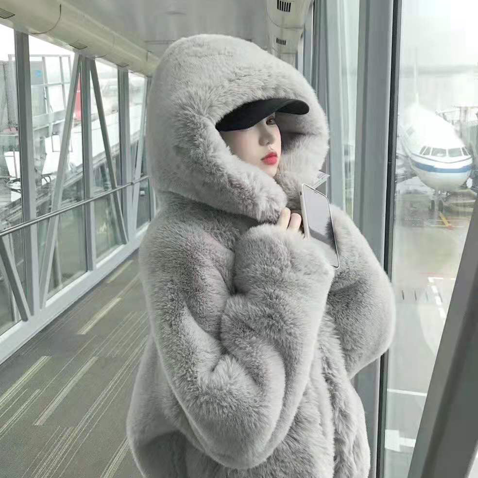 Loose faux fur coat with hood for women