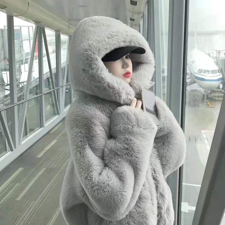 Loose faux fur coat with hood for women