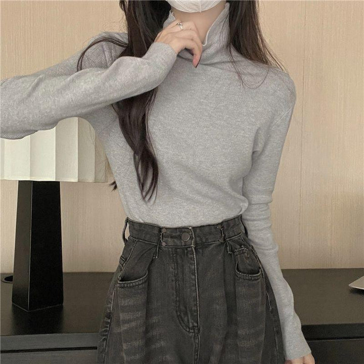 Women's knitted sweater, roll neck, body-hugging