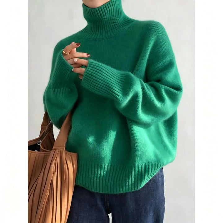 Loose women's knitted sweater with turtleneck