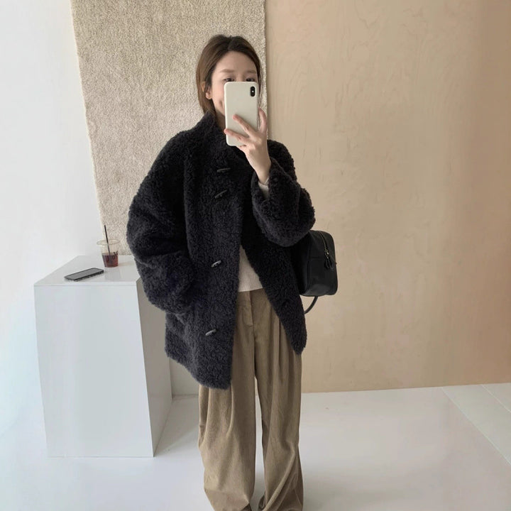 Wool coat with stand-up collar and toggle buttons