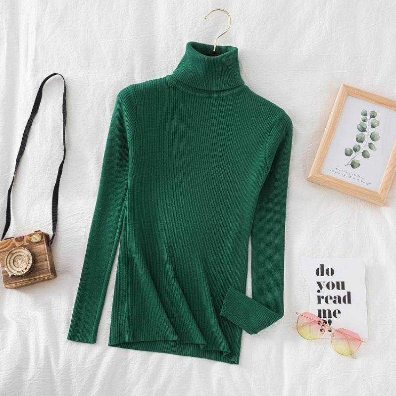 Women's knitted sweater with high collar, fitted