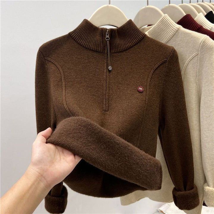 Padded women's knitted sweater with zipper and stand-up collar