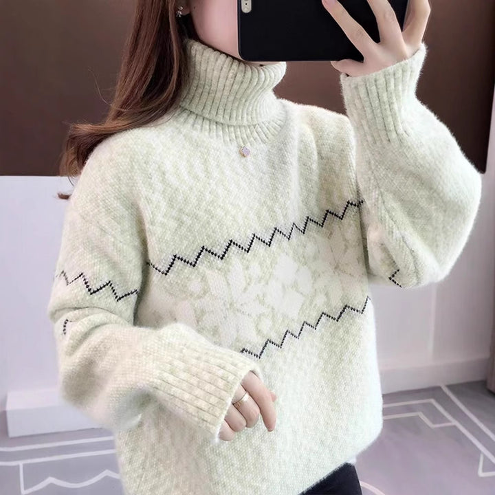 Women's knitted pullover with snowflake pattern and stand-up collar
