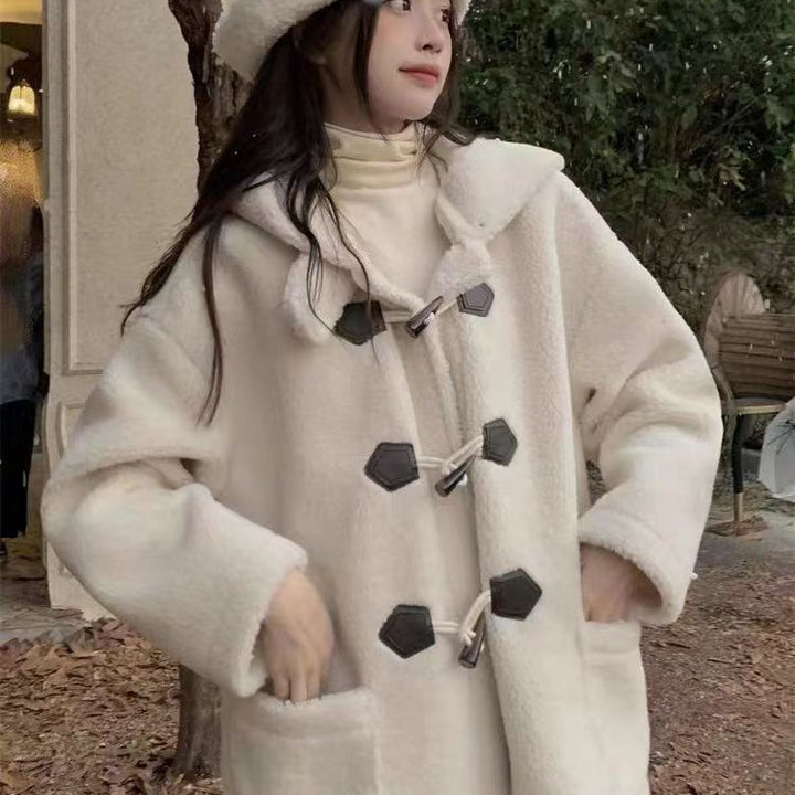 Long coat with toggles and lambskin look