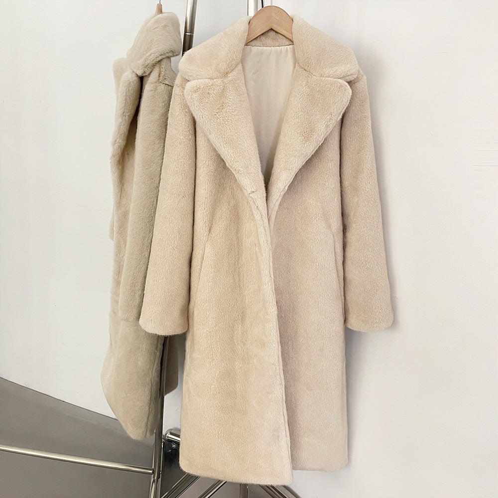 Elegant faux fur coat with lapel collar