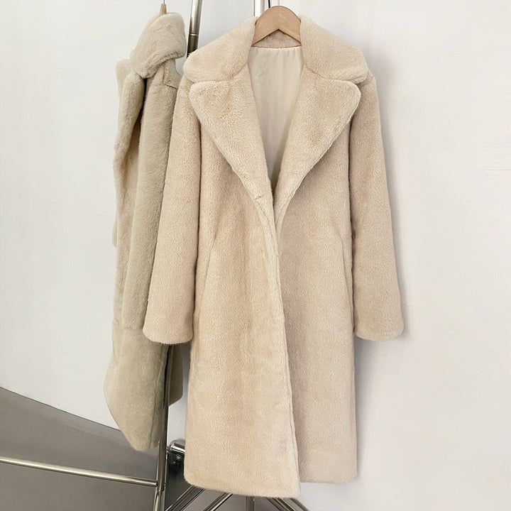 Elegant faux fur coat with lapel collar