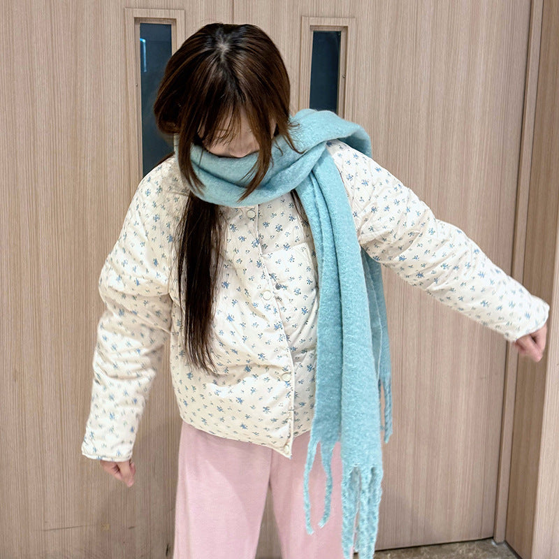 Short women's quilted jacket with floral pattern, oversized cut
