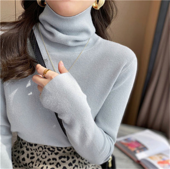 Women's knitted pullover with stand-up collar, slim fit